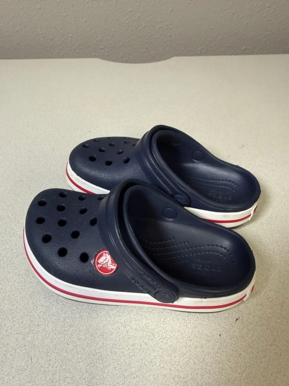 CROCS Kids Navy Clogs with White and Red Trim
